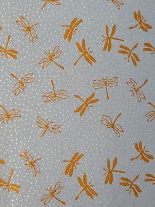 
Gold Dragonflies on blue-grey