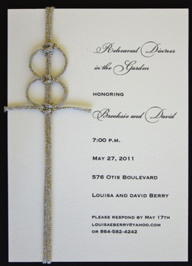 
Rehearsal Dinner with silver cord 
knotted in double wedding rings
